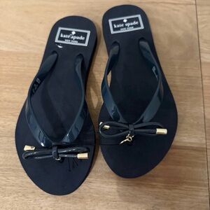 NWOT Kate Spade Black Sandals with Gold Bow Detail